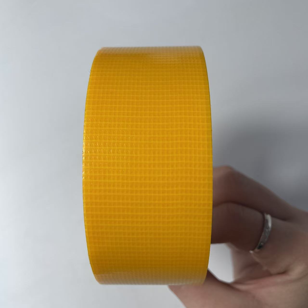 Tape adhesiva de tela de alta viscosidad decoración sin rastro película adhesiva de tela de malla adhesiva de tela unilateral cinta adhesiva de tela