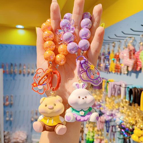 Little rabbit creative face toot little animal keychain pendant female cute couple key chain bag mobile phone pendant wholesale
