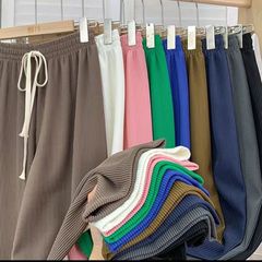 蛇の骨の紋様の広腿のズボンの女性の春秋の新型の高い腰はやせていることを現してズボンを引きずって感じます。