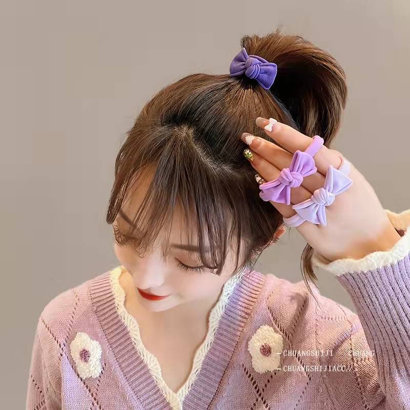 Banda de pelo de color caramelo de alto aspecto banda cuerda 2022 nuevo color cuerda de pelo popular en línea popular banda de goma para mujeres