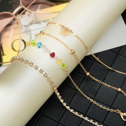 Korean-style Jewelry on AliExpress: Hot-selling 4-Piece Set of Retro Colorful Rhinestone Butterfly Multi-layer Anklets—Perfect Beach Foot Accessories for Europe and America