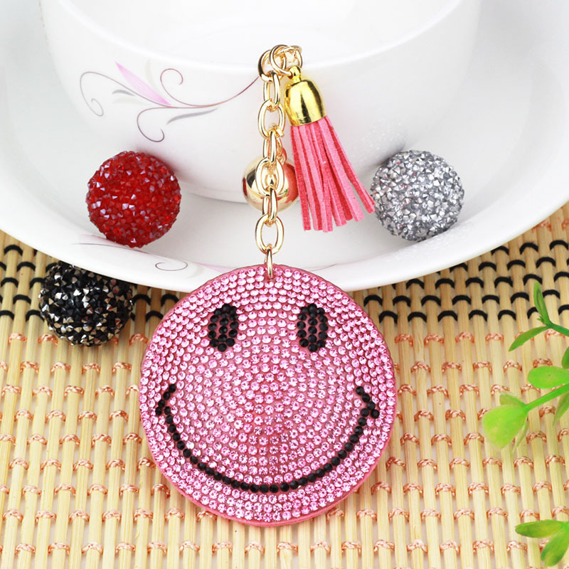 Nuevo creativo cara sonriente coreana llavero de diamante de moda borda de dama bolsos colgantes joyerías de comercio exterior al por mayor
