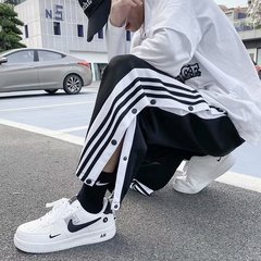 アメリカンスタイルのフルボタンパンツ、バスケットボール用スポーツパンツ、メンズストレートルーズフィットトレーニングパンツ、夏用カジュアルパンツ、耐摩耗性と快適性