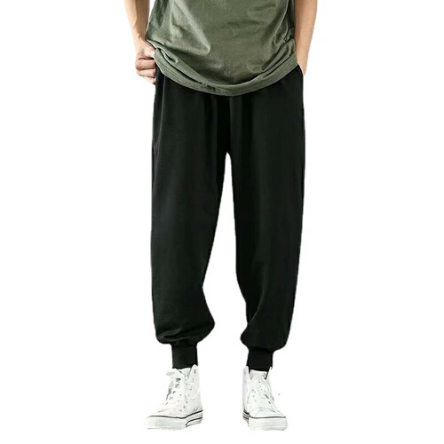 Summer lightweight pants for men: trendy gray ankle-banded, loose-fit sports basketball sweatpants—versatile, knitted, and cropped.