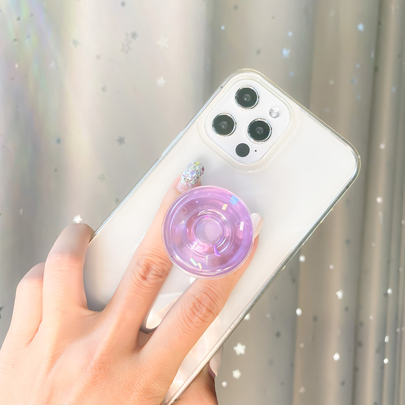 Transparent mobile phone airbag bracket, solid color donut adhesive, stable desktop, lazy person watching chasing_voghion.com