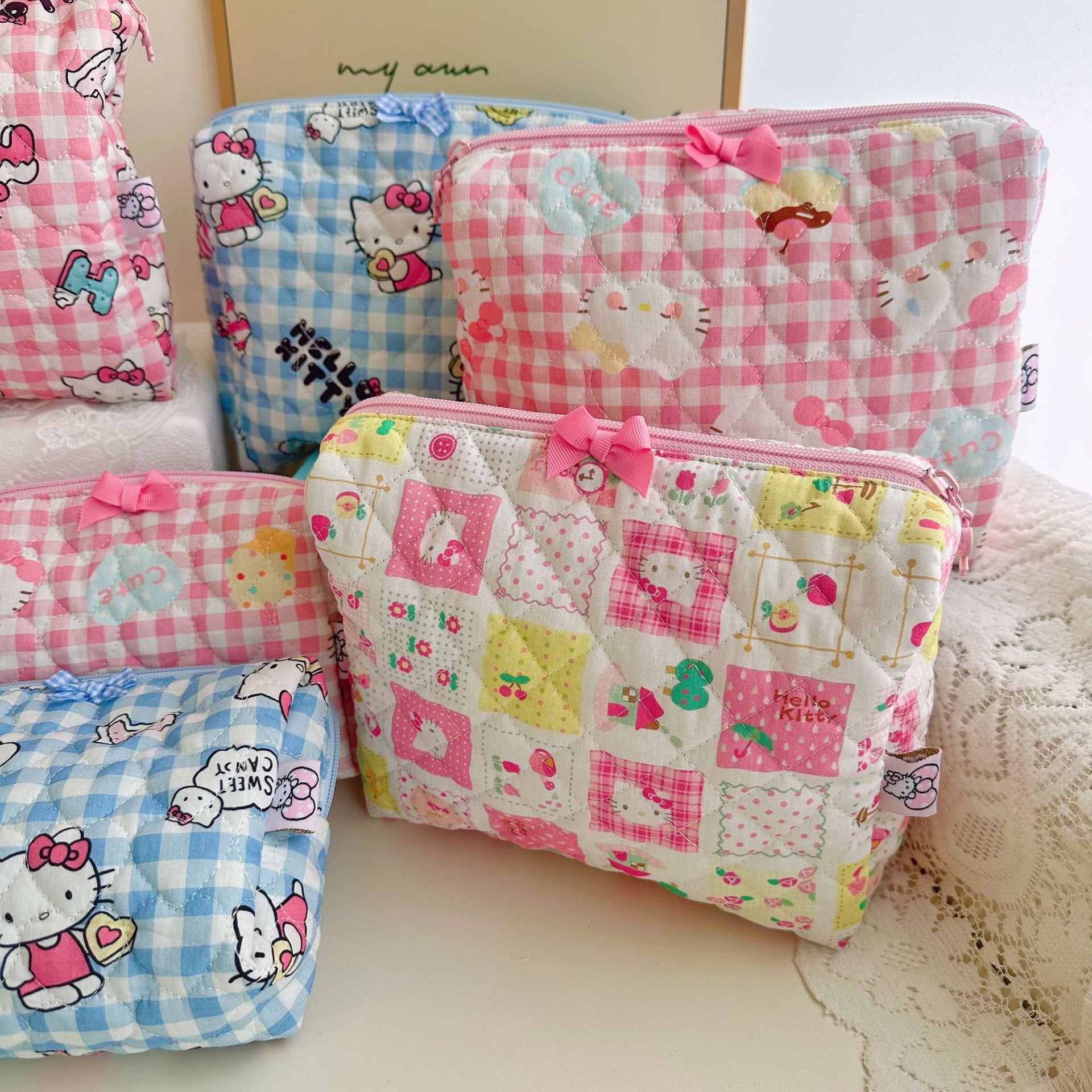 キルティング刺繍綿布芸アニメかわいいKT少女口紅化粧品収納バッグ化粧バッグ手作りバッグ卸売り