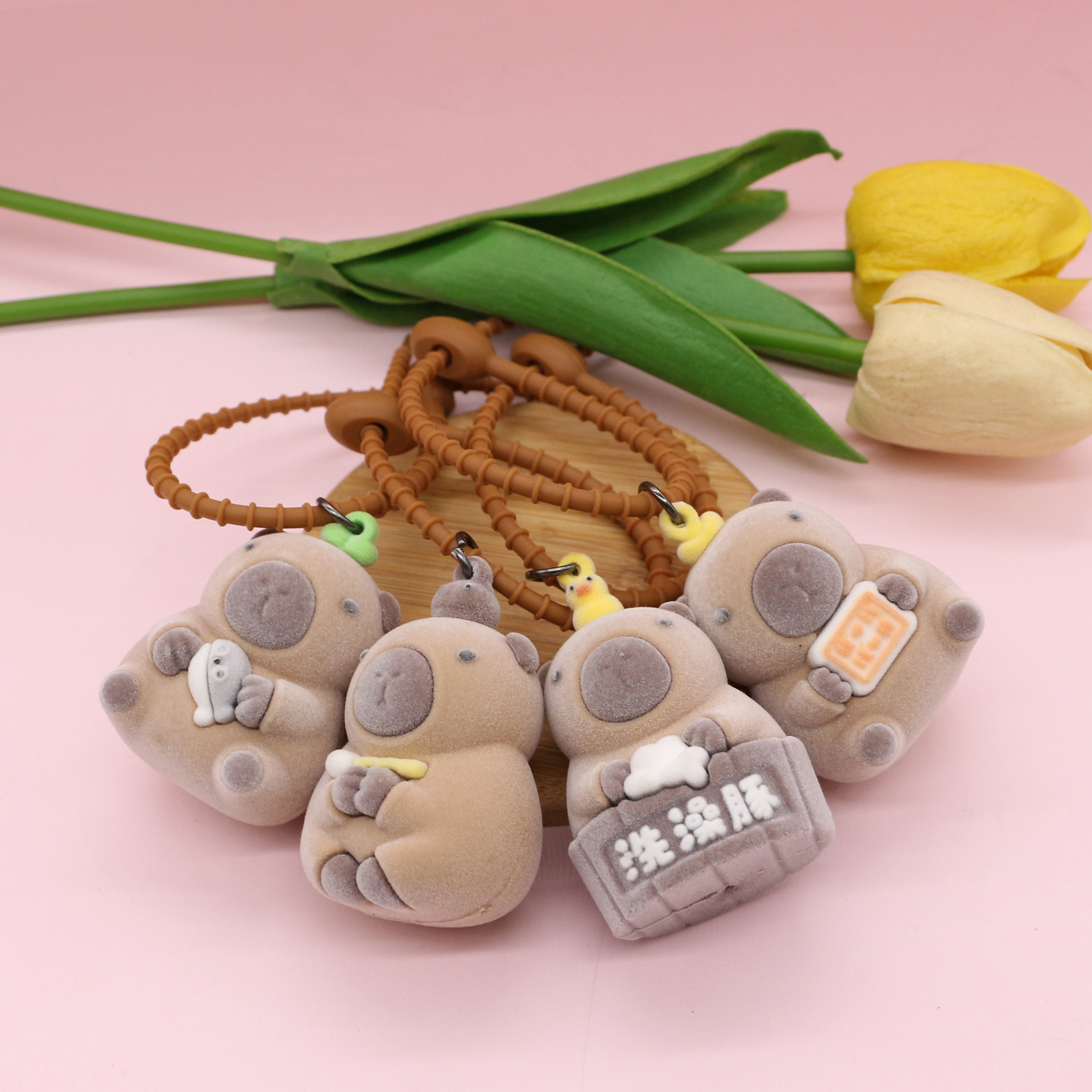 Explosiones transfronterizas flocado nutria llavero de caricatura tridimensional muñeca llavero colgante llavero de bolso