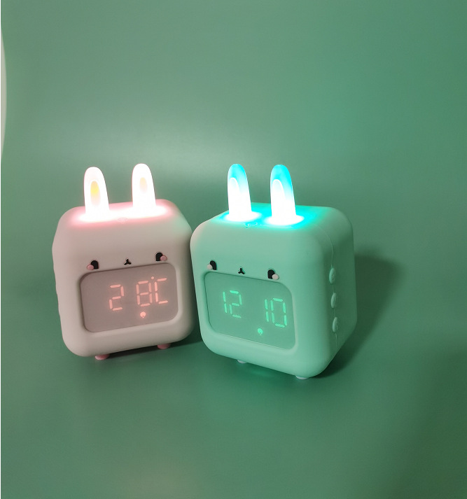 New products naughty rabbit children's alarm clock gift SD card custom ringtone silicone night light rabbit alarm clock wholesale 