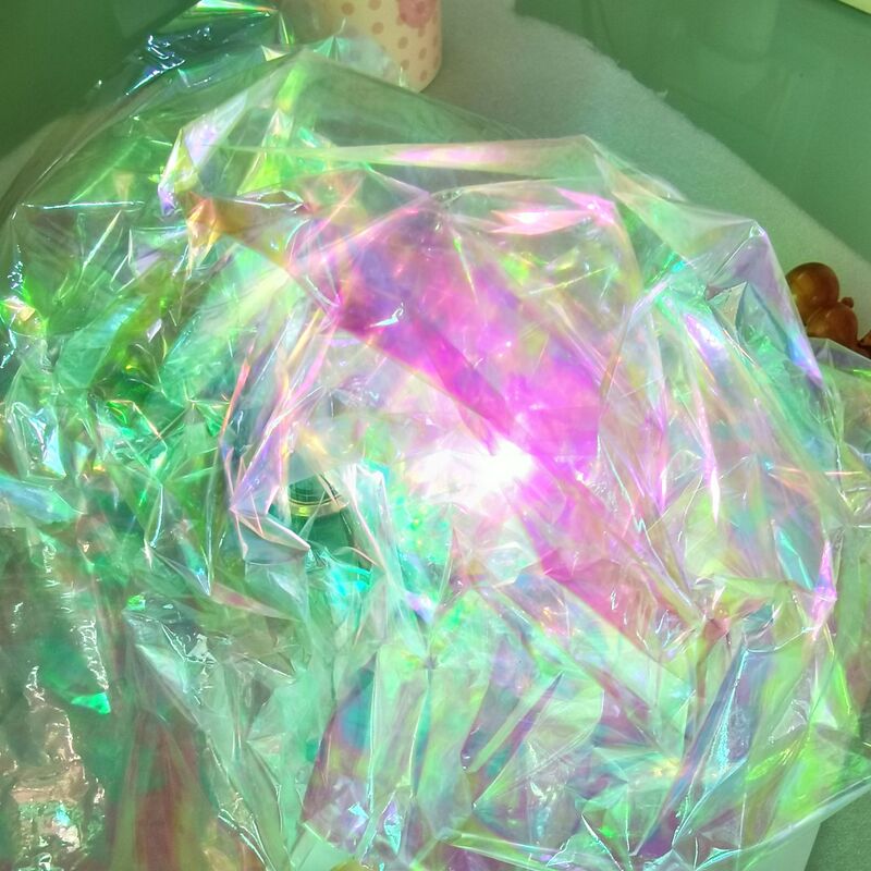 Large quantity and excellent price colorful Iris magic film packaging bag decoration fast delivery sequined veil
