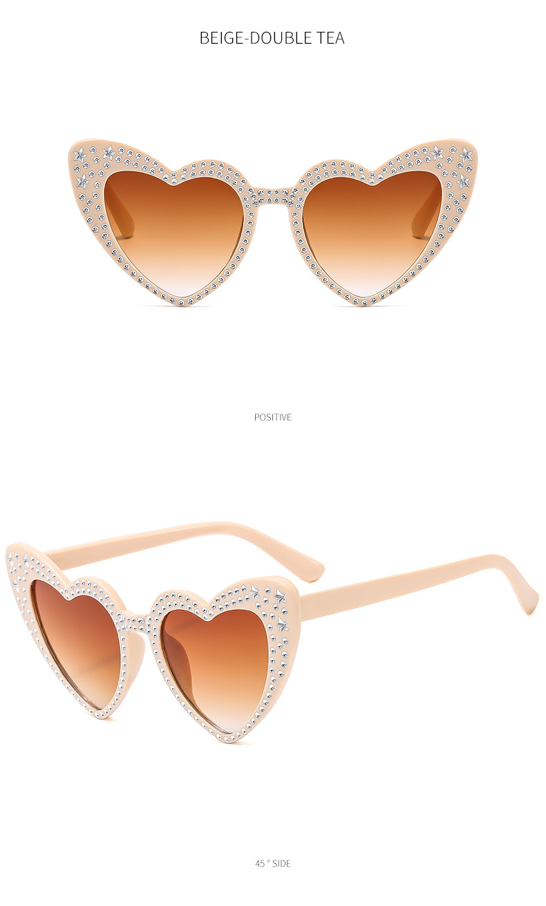 Occhiali da sole a cuore per donna eleganti con strass alla moda_voghion.com