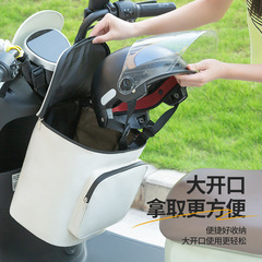電気自動車の収納袋の前に電気自動車の荷物を掛けて自転車の自転車のオートバイの荷物を包んでヘルメットを包みます。