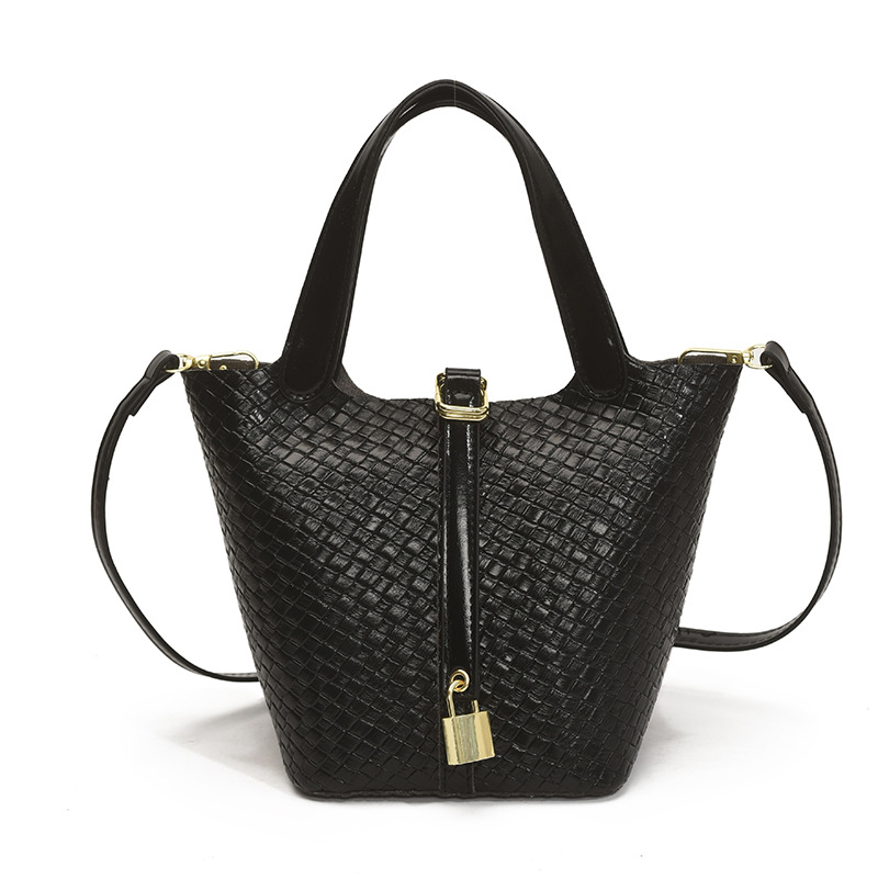 Bolso de cubo portátil con patrón tejido para mujer 2025 nuevo estilo coreano de lujo ligero de alta gama bolso de mensajero para niños de nicho