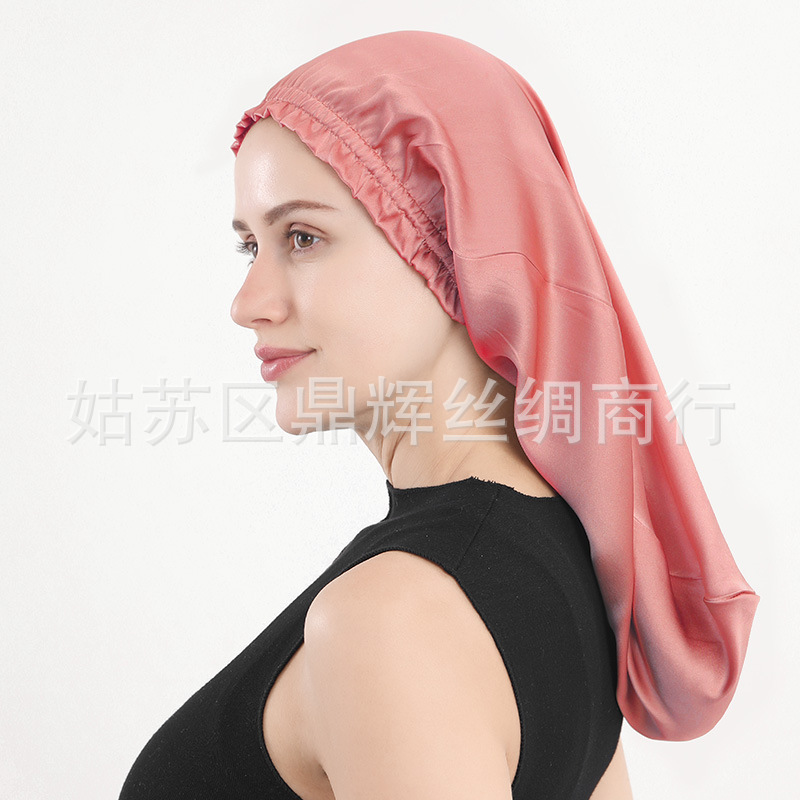 新商品のシルクの寝帽の桑のシルクの長髪の帽子の木の耳元の長い筒の帽子の女性の家庭のヘアケアの帽子のアマゾン