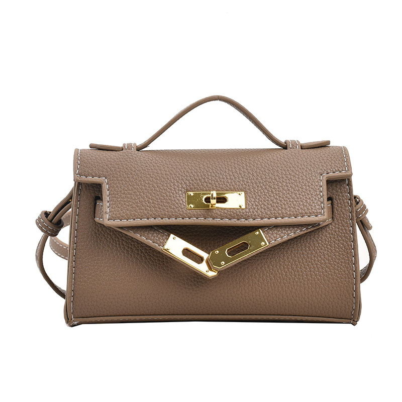 Mini bolso Kelly transfronterizo para niños, bolso de hombro tipo bandolera de un solo hombro con lápiz labial familiar de moda versión coreana de otoño 2023 para mujer