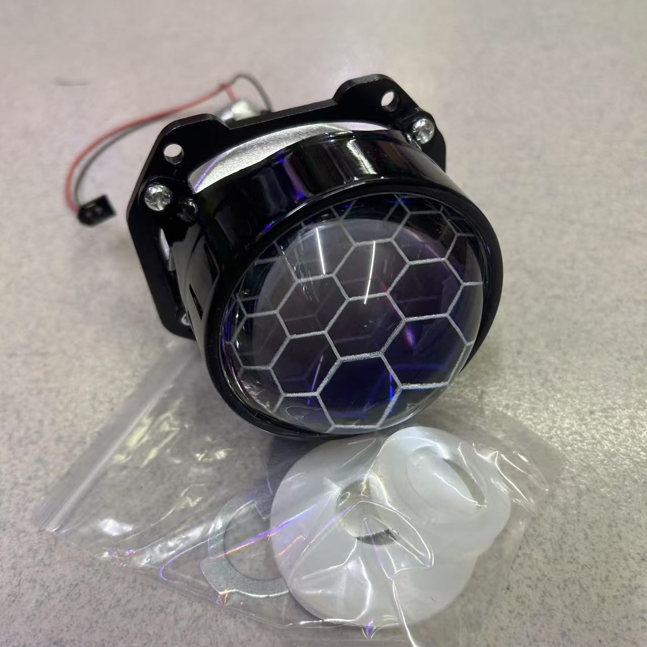 Faro de 2,5 pulgadas weishitong LED de doble luz lente universal sin pérdida de la lente del faro lejos y cerca de la luz integrada