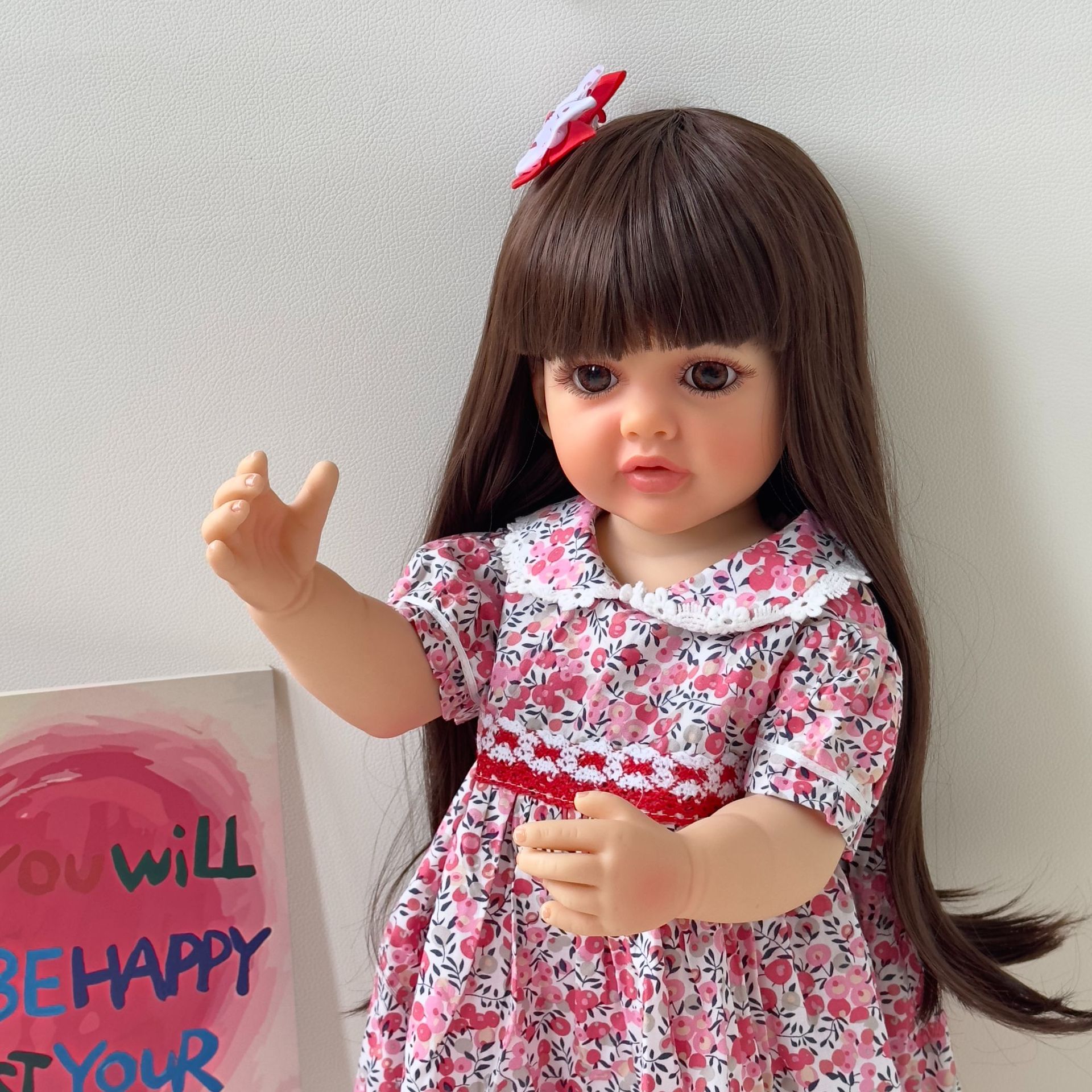 NPK 55cm falda floral de simulación de pegamento completo muñeca renacida Betty suministro de comercio electrónico transfronterizo entrega de una sola pieza