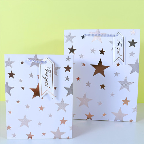 Cross-border special supply of hot stamping wavy pattern white card gift portable paper bag round ball five-pointed star shopping bag diagonal pattern