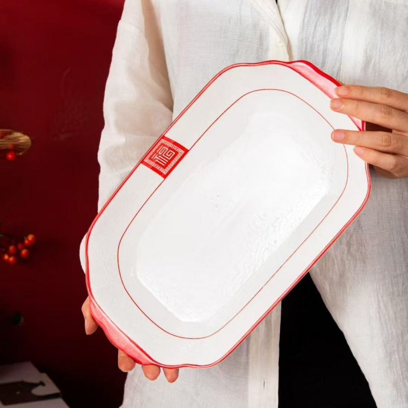 Serie de tallas de color esmalte de Año Nuevo Celebrado cubiertos de cerámica china rojos platos de platos de arroz caseros