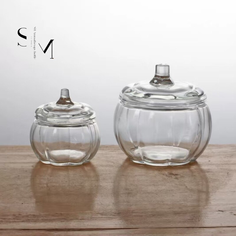 Cross-border transparent glass pumpkin-shaped storage jar, glass scented candle cup, creative candle holder with lid in stock Cross-border transparent glass pumpkin-shaped storage jar, glass scented candle cup, creative candle holder with lid in stock
