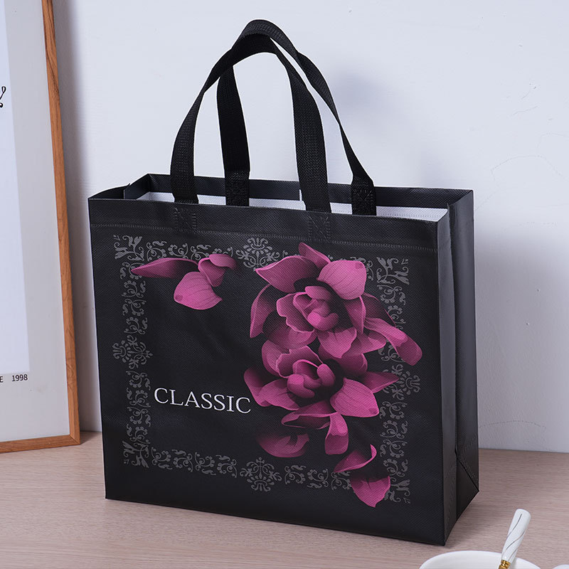 Embalaje de ropa roja bolsas de compras clásicas bolsas de mano no tejidas estereoscópicas de moda impresión en color de película - rosa negra