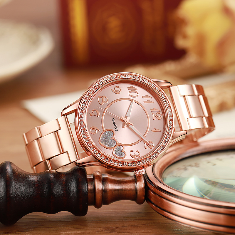 Nueva moda transfronteriza Corazón de melocotón correa de acero reloj de cuarzo estudiante oro rosa amor diamante reloj de mujer al por mayor
