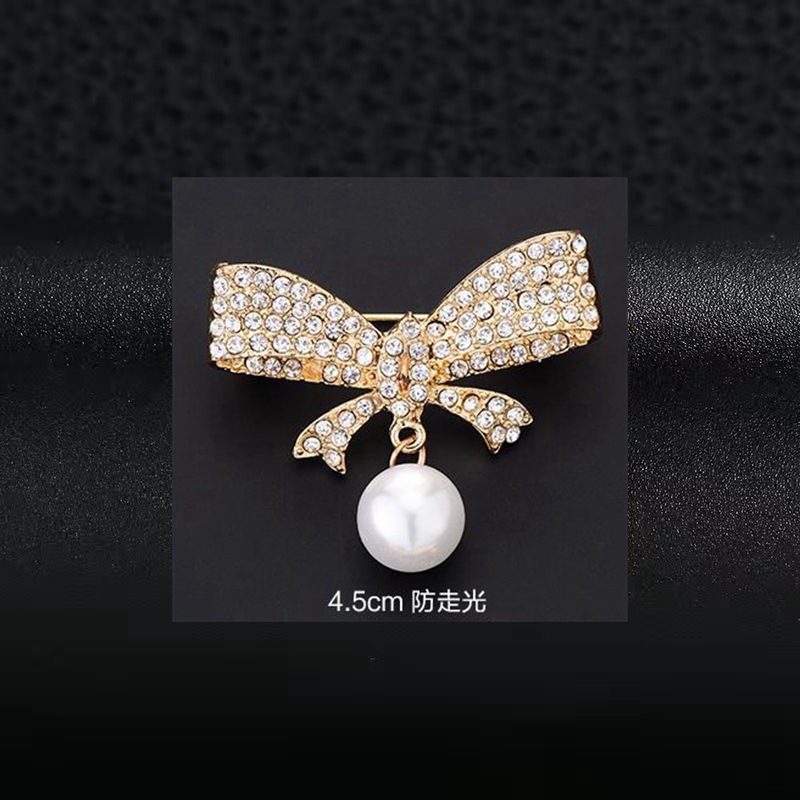 Broche à nœud papillon tendance en alliage anti-exposition haut de gamme, incrustée de diamants, style Coran, ornée de strass._voghion.com