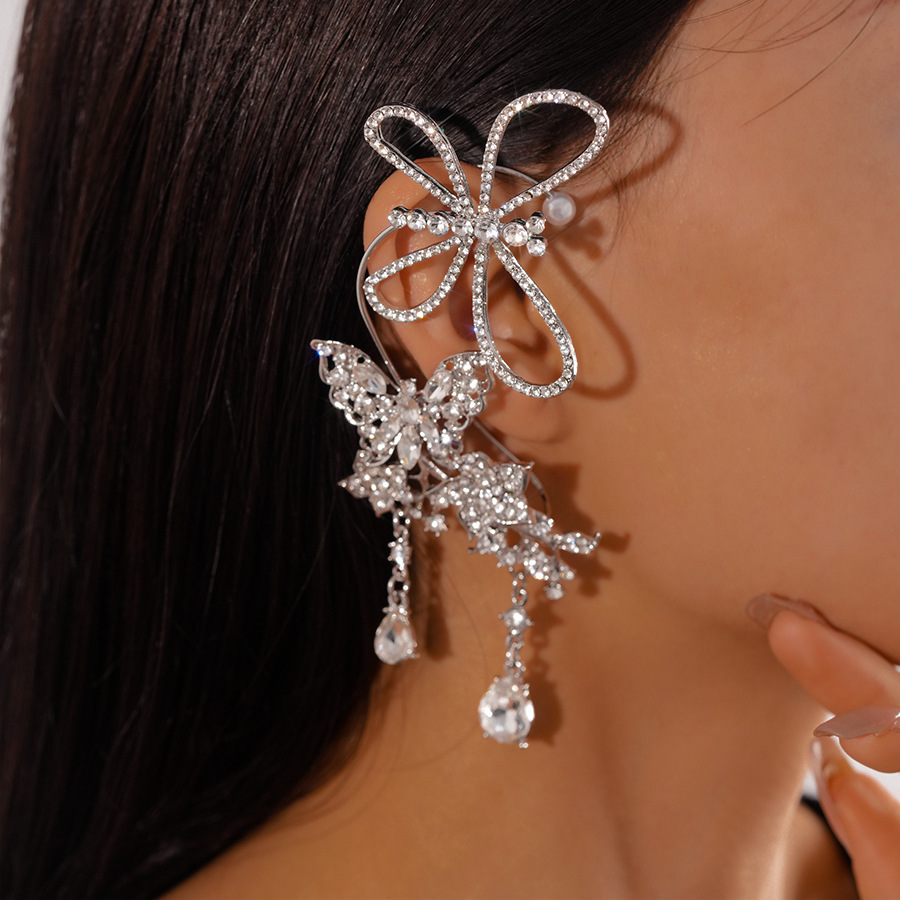 Súper destello y luz, estilo de lujo, mariposa con incrustaciones de diamantes, gotas de agua, orejas huecas, sin perforaciones, personalidad, temperamento de nicho, pendientes de sentido avanzado, mujeres