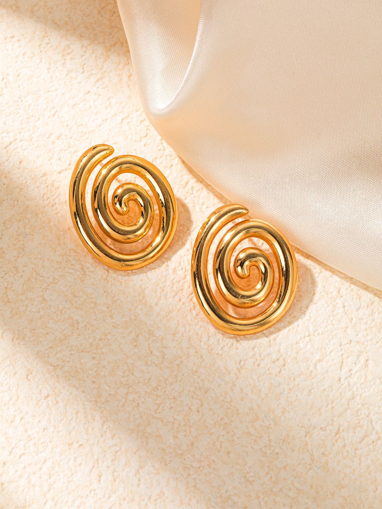 모기향 스핀 귀걸이