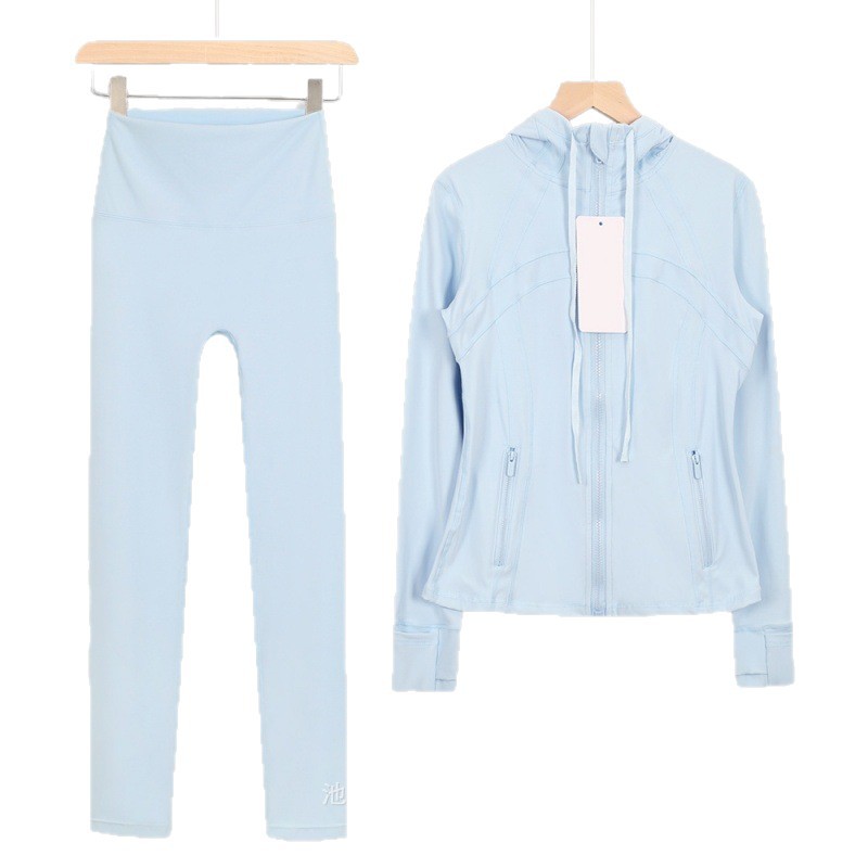Dames yoga-outfit met capuchon, bestaande uit een 9-punts legging en een slim fit jasje, casual sportkleding voor workouts en dagelijks gebruik._voghion.com