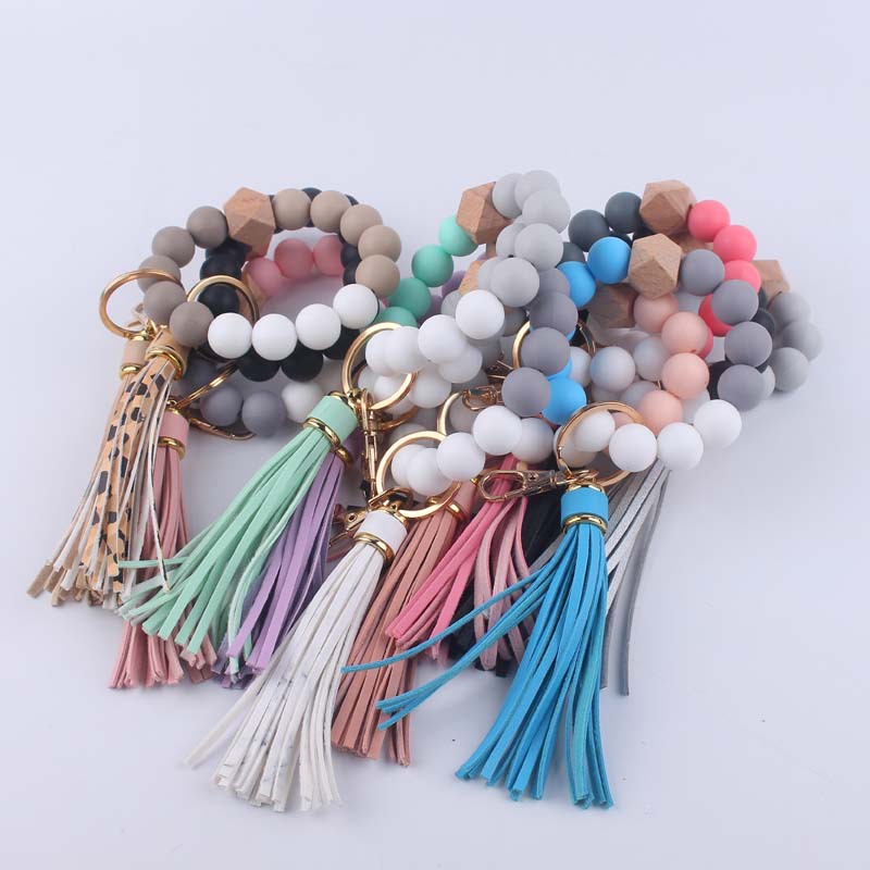 Pulsera de silicona pulsera llavero nuevo creativo DIY borla colgante contraste color