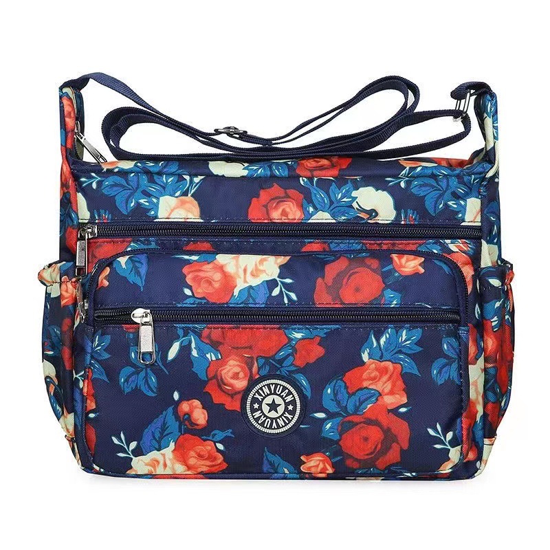 Bolsa de tela de flores bolsa de mensajero de las mujeres nueva bolsa de Madre de gran capacidad bolsa de hombro individual de mediana edad y ancianos bolsa de tela Oxford bolsa