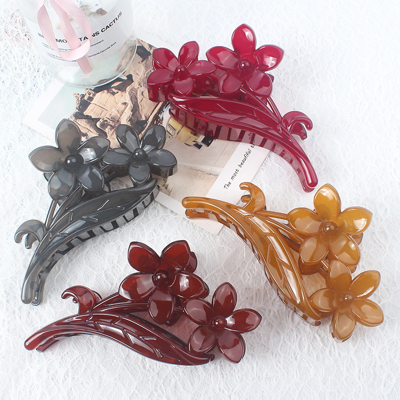 Otoño y invierno nuevos productos de color gelatina simple de alta sensación de flores agarrando clips de cabeza detrás de la red rojo universal clips de tiburón moda joyería para el cabello
