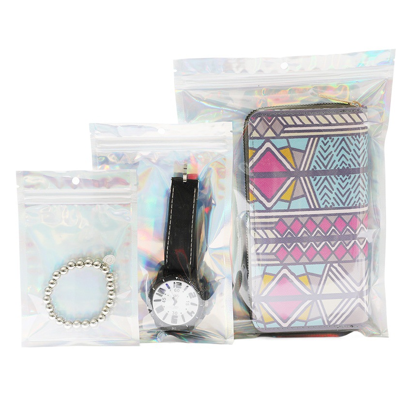 Bolsa autoadhesiva con láser bolsa de hueso autoadhesiva de PVC bolsa de sellado de película de perlas bolsa de hueso PE bolsa de pie bolsa de embalaje de color de hueso Yin y Yang