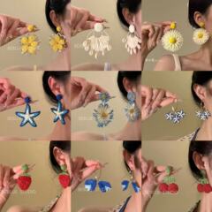 早春の甘いラフィラ編みの花のイヤリングinsシンプルな個性的な海辺のリゾート風の雰囲気