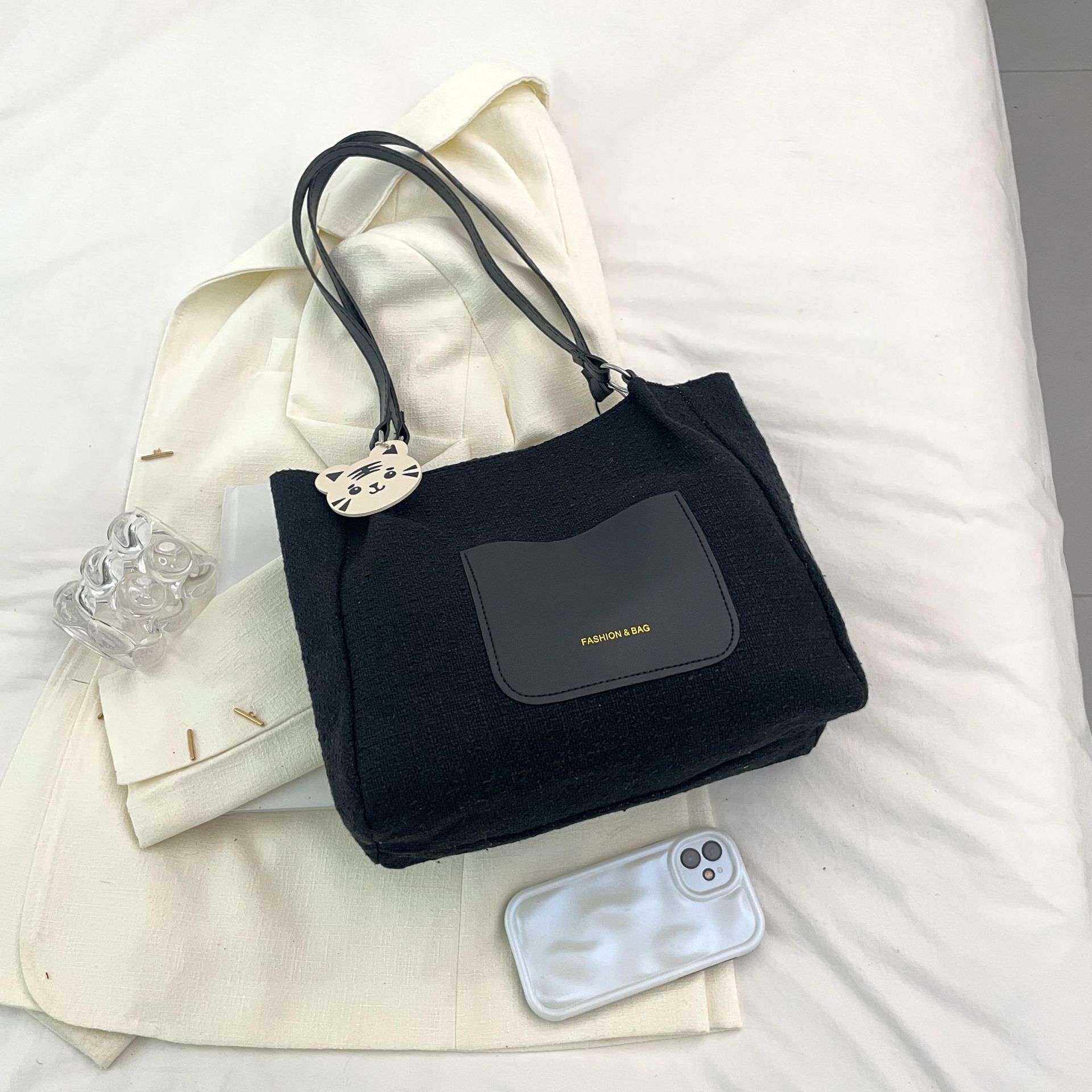 Diseño de nicho bolsos de punto para mujeres 2024 nuevos bolsos de moda de moda bolsos de hombro retro bolsos especiales de cercanías a cuadros