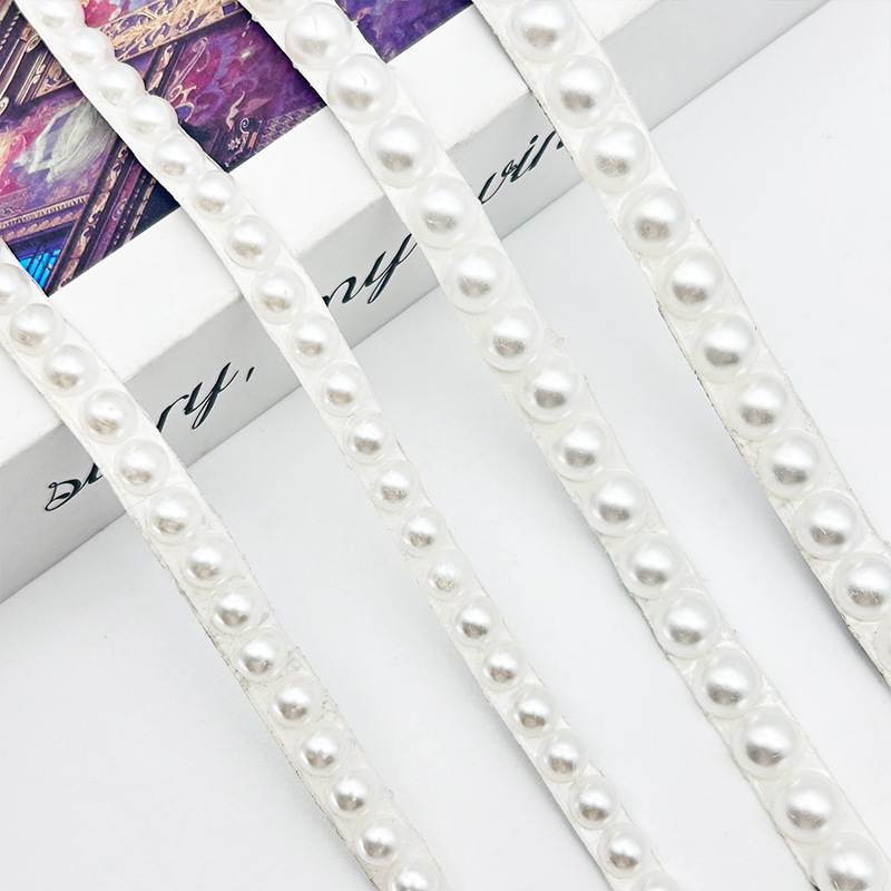 Nuevo producto Venta caliente Perla Tela de diamantes de imitación Adhesivo de fusión en caliente Diamante autoadhesivo Tela de diamantes flash Bolso de ropa Diy Cinta de diamantes de imitación de cerámica