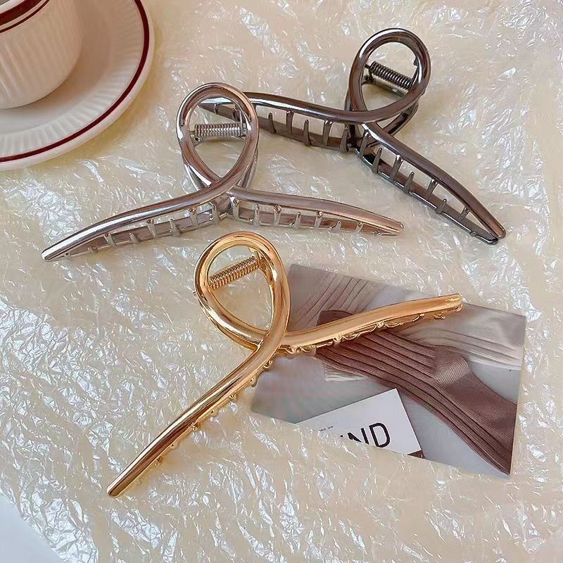 Women's Commute Solid Color Metal Stoving Varnish Hair Claws display picture 1