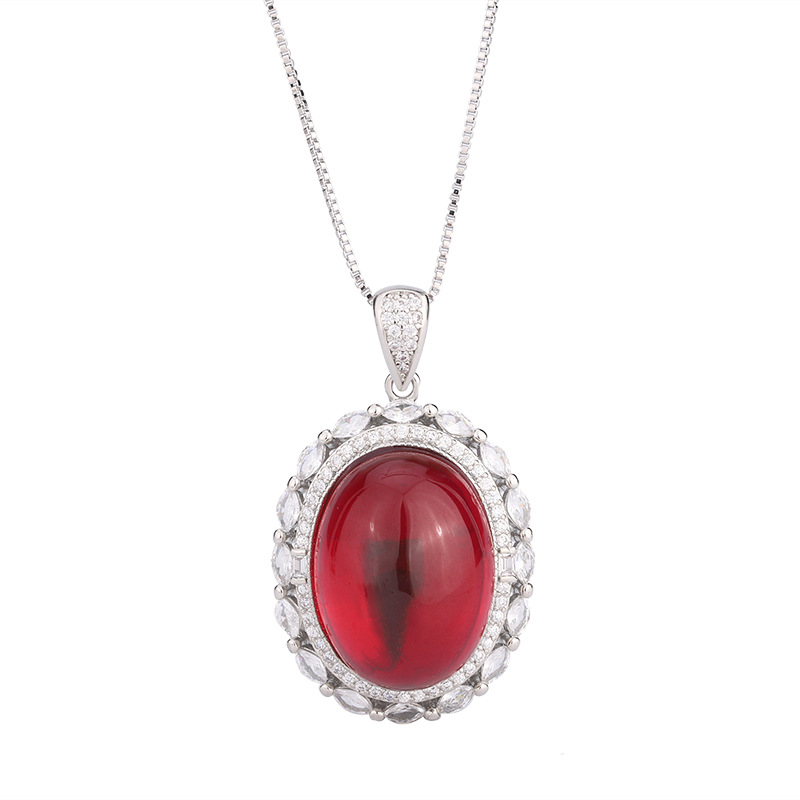 2024 nuevo estilo Zhuang Shengsheng joyería simulación paloma sangre rojo corindón cristal puntiagudo azul superficie lisa colgante retro maestro 15*20