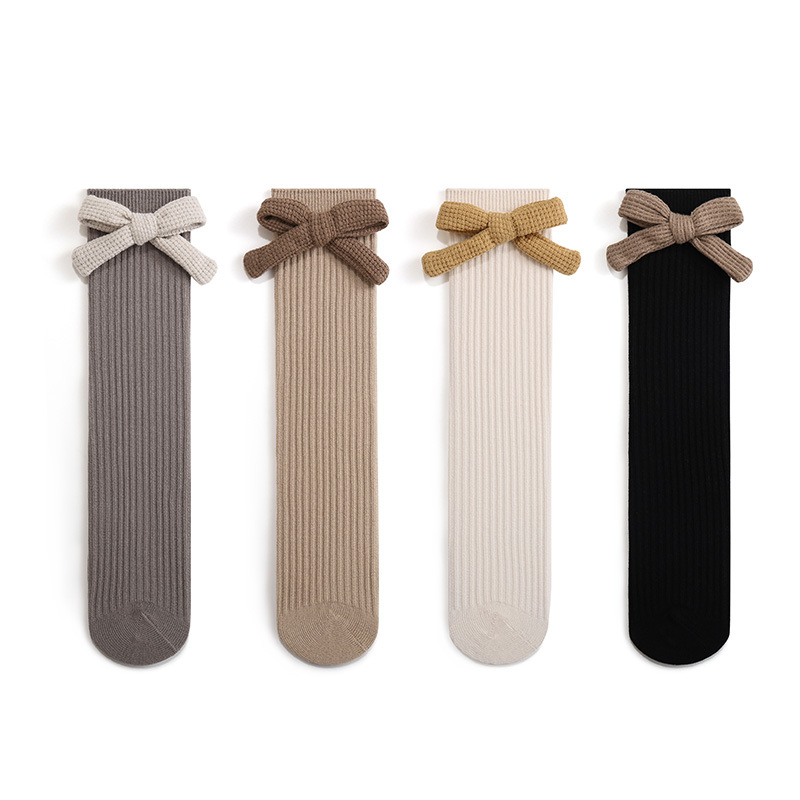 2023 Otoño Nuevas Chicas calcetines altos de algodón para bebés niñas Corea del Sur Estilo occidental arco grande Princesa JK calcetines largos