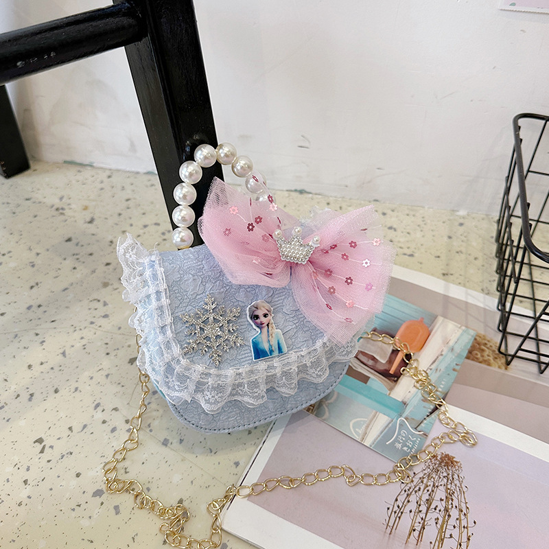 2025 nuevo bolso de perla para niños arco encantador caricatura cadena de estilo exterior bolsa de cambio de moda versátil