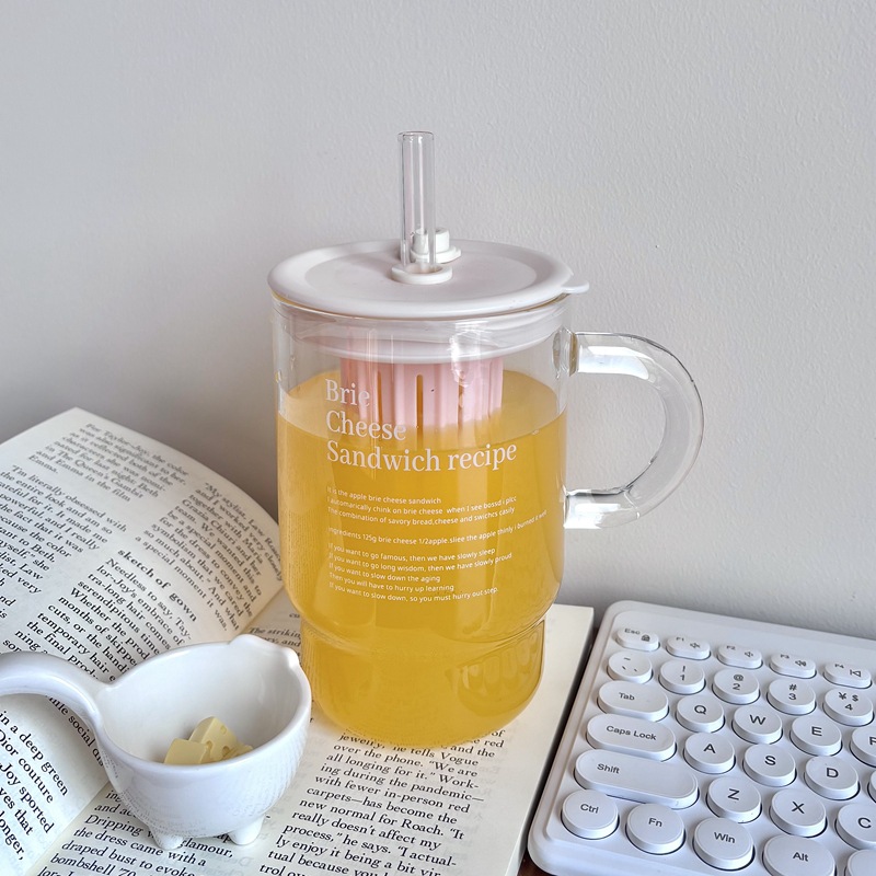 Taza de agua de vidrio de alto valor facial con cubierta de paja doméstica con letras de paja taza de paja de alto silicio taza resistente al calor estudiantes