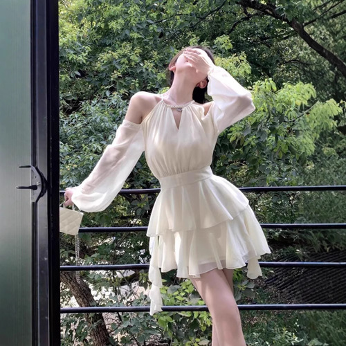 Elegant French-style champagne-colored chiffon dress: Autumn/Winter chiffon mini skirt with ruffled edges, cinched waist—perfect for a romantic date or as a princess-like short gown.