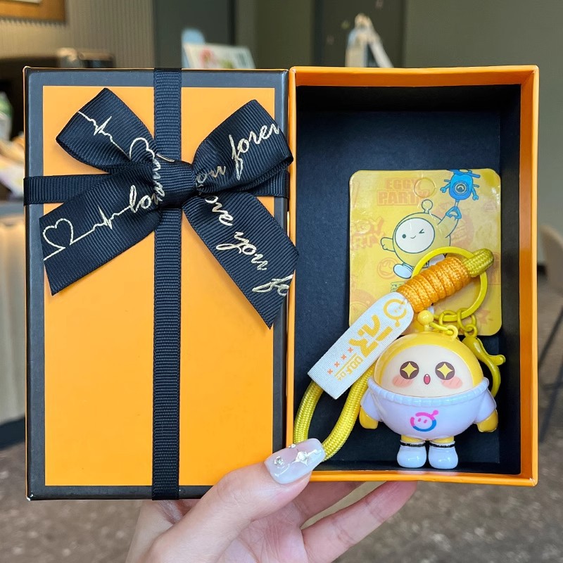 Genuino huevo de la fiesta llaveros huevo de vestir t llaveros bolsas creativas lindos colgantes juguetes huevo