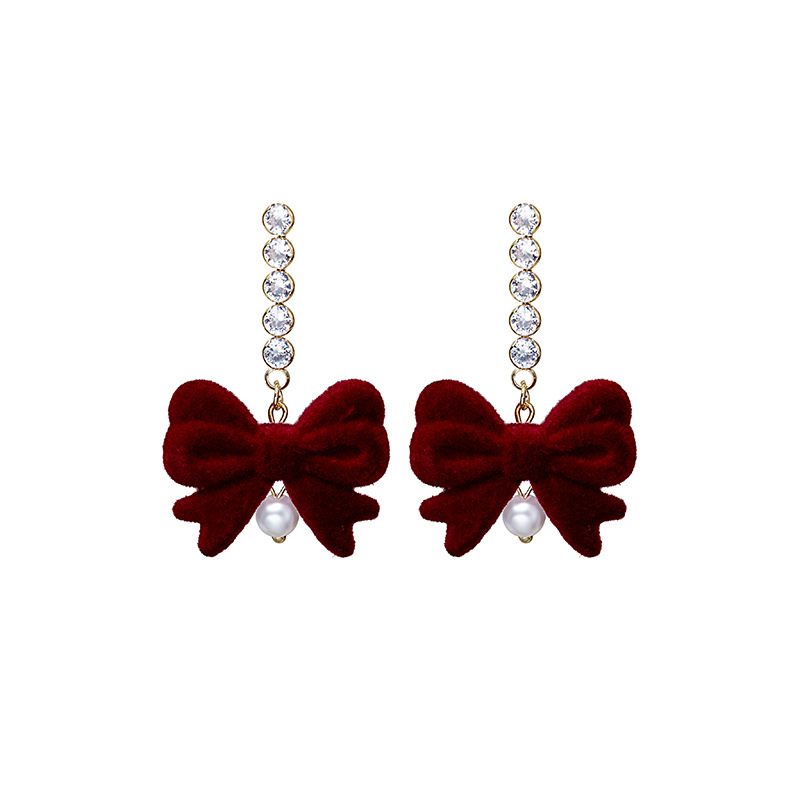 Aguja de plata Otoño e Invierno rojo vintage flocado arco borla pendientes ins Año Nuevo vino rojo Bola de piel pendientes de perlas