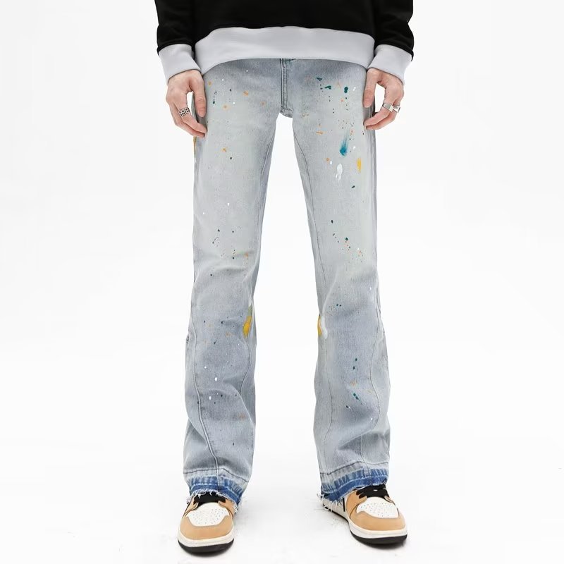 Jeans uomo slim fit stretch con strappi e taglio micro flare_voghion.com