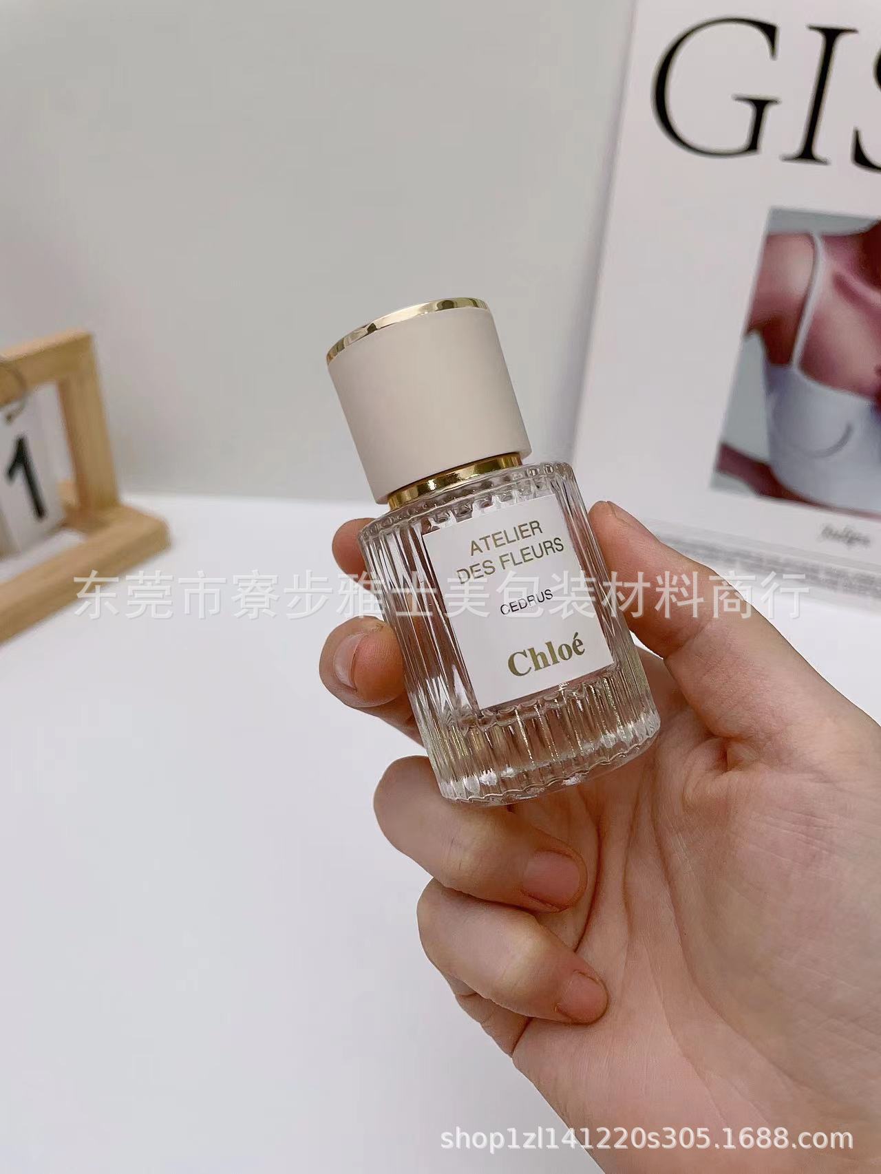 Botella de llenado de perfume de gama alta portátil 30ml botella de spray de vidrio de gama alta 50/100 ml botella pequeña vacía de reemplazo