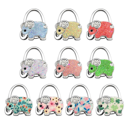 Taixiang bag hook, handbag hook, fashionable and creative metal folding bag buckle, table bag hanging device