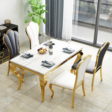 后现代轻奢大理石餐桌椅组合套装北欧创意不锈钢桌子高端家具餐桌