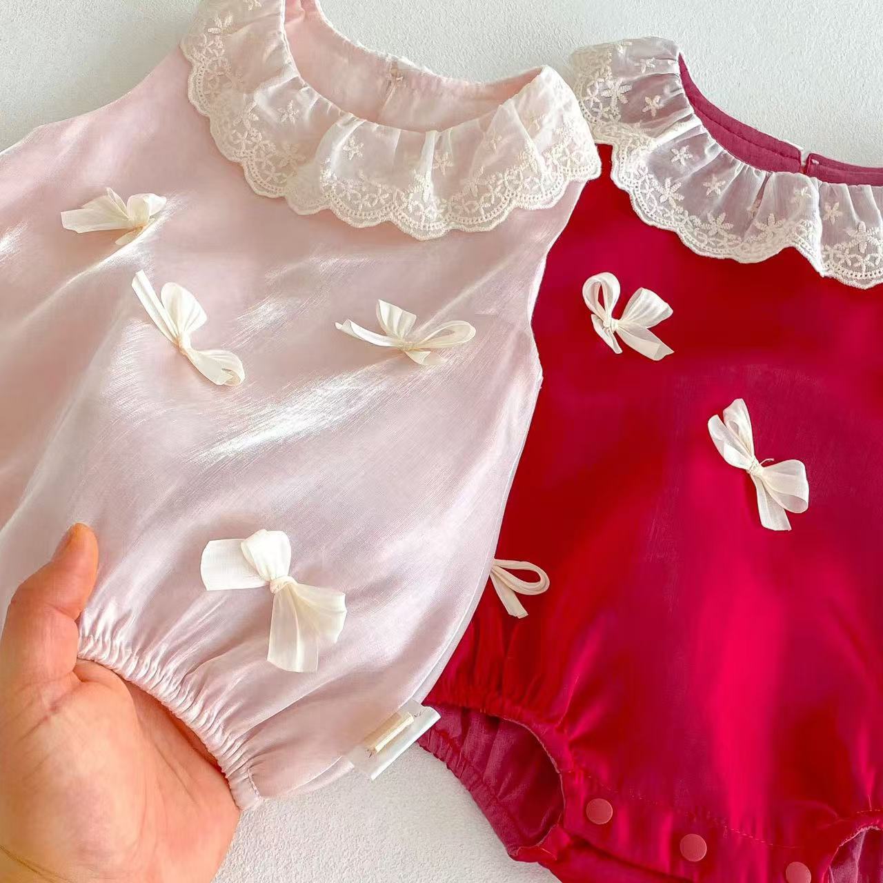 Ropa de pedo con lazo de bebé nuevo verano bebé versión coreana dulce mono recién nacido ropa de un año