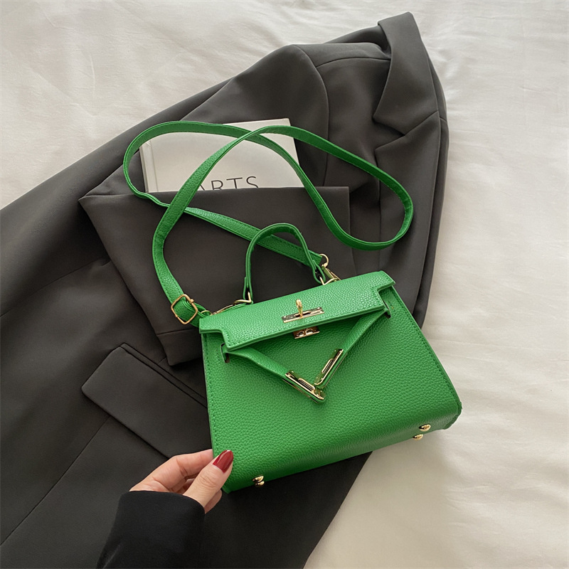 Nicho de alta sensación simple bolso de mano mujer 2024 nueva moda versátil bolso Kylie de moda bolso pequeño